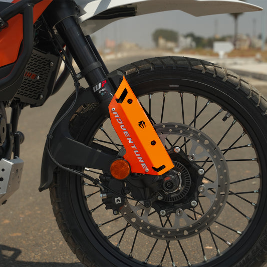 FORK PROTECTORS METAL - ORANGE    FOR  2025 FOR KTM 390 Adventure/Adventure X